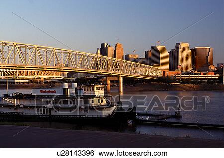 riverboat, skyline, Cincinnati, OH, Ohio, Barleycorn's Riverboat Restaurant along Riverboat Row on the Ohio River and Taylor-Southgate Bridge, downtown skyline of Cincinnati at sunrise. View Large Photo Image Stock Photograph - riverboat, skyline, Cincinnati, OH, Ohio, Barleycorn's Riverboat Restaurant along Riverboat Row on the Ohio River and Taylor-Southgate Bridge, downtown skyline of Cincinnati at sunrise. . Fotosearch
