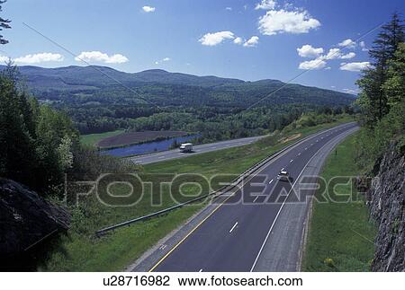 Stock Image -  road, interstate, spring, Barnet, VT, Vermont, Scenic view of I-91 passing through Barnet in the spring.. Fotosearch