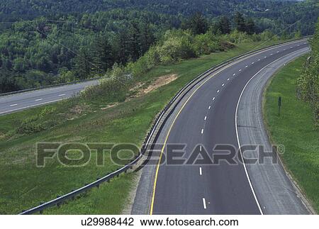 Stock Image -  road, interstate, spring, Barnet, VT, Vermont, Scenic view of I-91 passing through Barnet in the spring.. Fotosearch