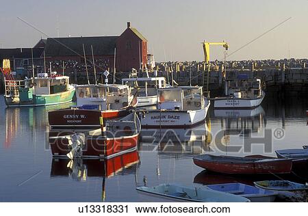 Stock Image -  Rockport, harbor, lobster boats, MA, Massachusetts, Fishing boats docked in Rockport Harbor in the fishing village of Rockport in the fall.. Fotosearch