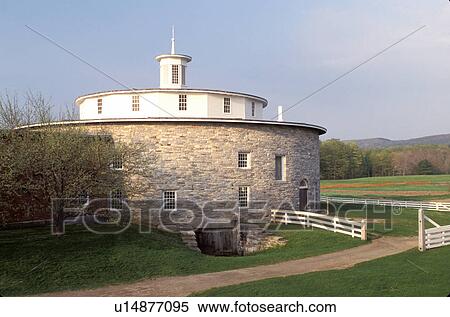 Stock Photography -  round barn, Shaker Museum, Pittsfield, shakers, Massachusetts, The Berkshires, Round Stone Barn at the Hancock Shaker Village in Pittsfield, Massachusetts in the spring.. Fotosearch