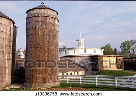 round barn, Shaker Museum, shakers, Pittsfield, Massachusetts, The Berkshires, Round Stone Barn at the Hancock Shaker Village in Pittsfield, Massachusetts in the spring. View Large Photo Image Stock Photo - round barn, Shaker Museum, shakers, Pittsfield, Massachusetts, The Berkshires, Round Stone Barn at the Hancock Shaker Village in Pittsfield, Massachusetts in the spring.. Fotosearch