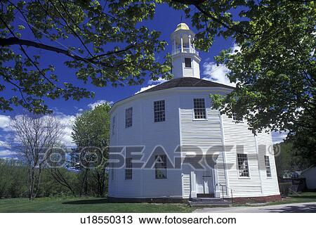 Stock Image -  round church, spring, Richmond, VT, Vermont, Old Round Church a (16-sided polygon) National Historical Landmark in Richmond in the spring. . Fotosearch