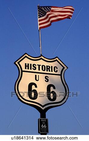 Route 66, road sign, Springfield, U. S. Flag, IL, Illinois, American Flag flies above an Historic Route 66 road sign in Springfield, Illinois. View Large Photo Image Picture - Route 66, road sign, Springfield, U. S. Flag, IL, Illinois, American Flag flies above an Historic Route 66 road sign in Springfield, Illinois. . Fotosearch