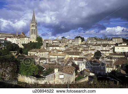 Saint Emilion, Aquitaine, Bordeaux Wine Region, France, Gironde, Europe, Eglise Monolithe rises above the medieval village of St. Emilion. View Large Photo Image Stock Image - Saint Emilion, Aquitaine, Bordeaux Wine Region, France, Gironde, Europe, Eglise Monolithe rises above the medieval village of St. Emilion.. Fotosearch