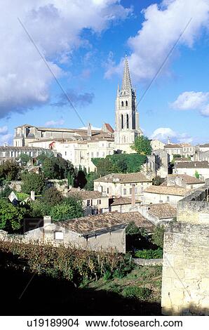 Saint Emilion, Bordeaux Wine Region, Aquitaine, Gironde, France, Europe, Eglise Monolithe rises above the medieval village of St. Emilion. View Large Photo Image Picture - Saint Emilion, Bordeaux Wine Region, Aquitaine, Gironde, France, Europe, Eglise Monolithe rises above the medieval village of St. Emilion.. Fotosearch