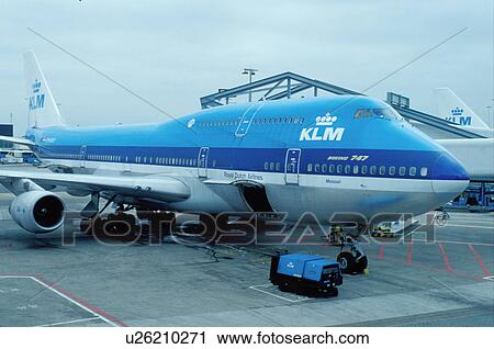 Schiphol, airplane, KLM, airport, Amsterdam, The Netherlands, Holland, Europe, KLM Royal Dutch Airline passenger plane is parked outside the terminal at Schiphol International Airport in Amsterdam. View Large Photo Image Stock Image - Schiphol, airplane, KLM, airport, Amsterdam, The Netherlands, Holland, Europe, KLM Royal Dutch Airline passenger plane is parked outside the terminal at Schiphol International Airport in Amsterdam.. Fotosearch