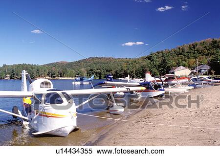 Stock Photography -  seaplane, Adirondacks, New York, NY, Long Lake, Seaplanes along the beach at Long Lake in the Adirondack Mountains.. Fotosearch