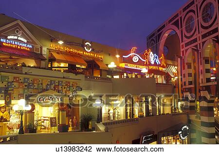 Stock Image -  shopping mall, San Diego, California, CA, Westfield Shoppingtown Horton Plaza an open-air, multi-level complex in downtown San Diego in the evening.. Fotosearch