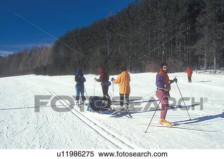 ski, cross-country skiing, Stowe, Vermont, VT, TFL, People cross-country skiing on a sunny winters day at the Trapp Family Lodge in Stowe. View Large Photo Image Stock Photography - ski, cross-country skiing, Stowe, Vermont, VT, TFL, People cross-country skiing on a sunny winters day at the Trapp Family Lodge in Stowe.. Fotosearch