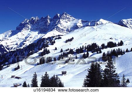 Picture -  ski resort, Alps, Switzerland, Valais, Les Crosets, Portes du Soleil, Swiss Alps, Europe, Dents du Midi, Scenic view of the Portes du Soleil ski resort the largest international and linked ski area in the world in the Swiss Alps.. Fotosearch