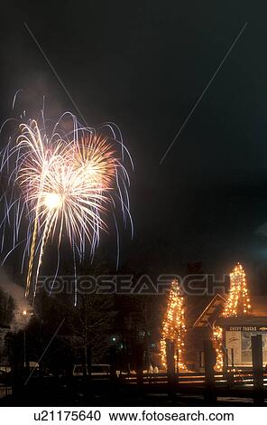 ski resort, fireworks, Stowe, holiday, snow, evening, winter, Vermont, Firework display at the Festival of Lights at Stowe Mountain Resort on a snow covered night in Stowe in Lamoille County in the state of Vermont. View Large Photo Image Stock Image - ski resort, fireworks, Stowe, holiday, snow, evening, winter, Vermont, Firework display at the Festival of Lights at Stowe Mountain Resort on a snow covered night in Stowe in Lamoille County in the state of Vermont. . Fotosearch