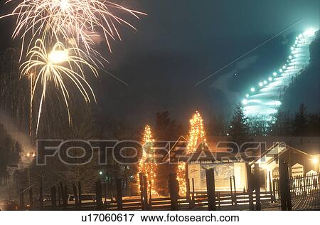 ski resort, Stowe, fireworks, skiing, torch light, holiday, evening, winter, Vermont, Firework display and torchlight parade at the Festival of Lights at Stowe Mountain Resort on a snow covered night in Stowe in Lamoille County in the state of Vermont. View Large Photo Image Stock Photo - ski resort, Stowe, fireworks, skiing, torch light, holiday, evening, winter, Vermont, Firework display and torchlight parade at the Festival of Lights at Stowe Mountain Resort on a snow covered night in Stowe in Lamoille County in the state of Vermont. . Fotosearch