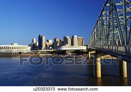 Stock Image -  skyline, bridge, stadium, Cincinnati, OH, Ohio, Cinergy Field and downtown skyline of Cincinnati from the Taylor-Southgate Bridge crossing the Ohio River. . Fotosearch