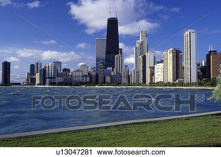 Stock Image -  skyline, Chicago, Illinois, IL, Lake Michigan, Downtown skyline of Chicago from Lake Shore Park on Lake Michigan.. Fotosearch