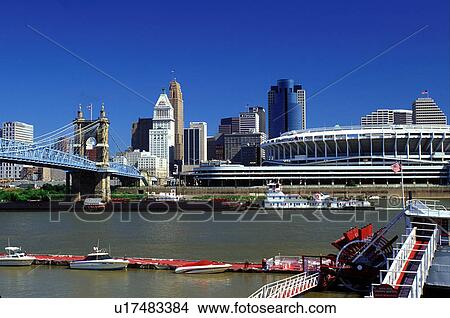 Picture -  skyline, Cincinnati, stadium, bridge, OH, Ohio, Downtown skyline, John A. Roebling Suspension Bridge, Ohio River, Cinergy Field.. Fotosearch