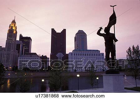 Stock Photo -  skyline, Columbus, OH, Ohio, Downtown skyline, Scioto River, sunrise.. Fotosearch
