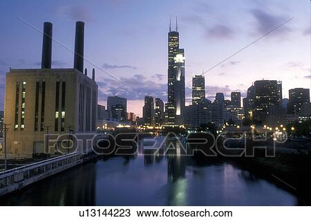 skyline, evening, Chicago, Illinois, IL, Downtown skyline of Chicago along the Chicago River in the evening. View Large Photo Image Stock Image - skyline, evening, Chicago, Illinois, IL, Downtown skyline of Chicago along the Chicago River in the evening.. Fotosearch