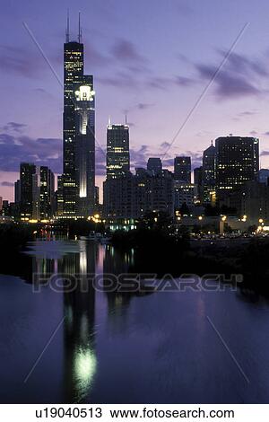 skyline, evening, Chicago, Illinois, IL, Downtown skyline of Chicago along the Chicago River in the evening. View Large Photo Image Stock Image - skyline, evening, Chicago, Illinois, IL, Downtown skyline of Chicago along the Chicago River in the evening.. Fotosearch