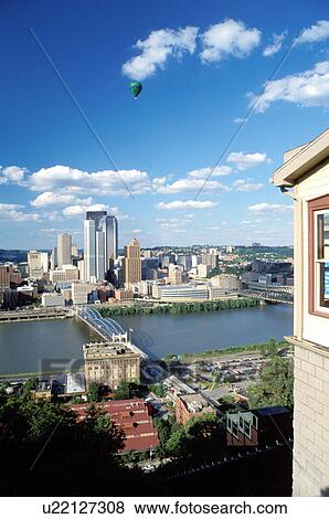 skyline, hot-air balloon, PA, Pittsburgh, Aerial, Pennsylvania, Downtown skyline of Pittsburgh and hot-air balloon from the Three Rivers Regatta Festival along the Monongahela River. View Large Photo Image Stock Photo - skyline, hot-air balloon, PA, Pittsburgh, Aerial, Pennsylvania, Downtown skyline of Pittsburgh and hot-air balloon from the Three Rivers Regatta Festival along the Monongahela River.. Fotosearch