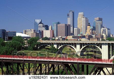 skyline, Minneapolis, MN, Minnesota, Twin Cities, Downtown skyline of Minneapolis and Stone Arch Bridge along the Mississippi River. View Large Photo Image Stock Image - skyline, Minneapolis, MN, Minnesota, Twin Cities, Downtown skyline of Minneapolis and Stone Arch Bridge along the Mississippi River. . Fotosearch