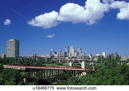 Stock Photography -  skyline, Minneapolis, MN, Minnesota, Twin Cities, Downtown skyline of Minneapolis along the Mississippi River. . Fotosearch