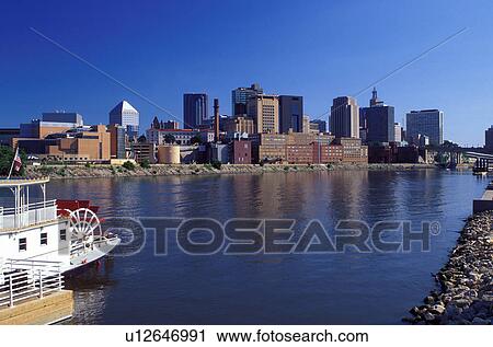 skyline, St. Paul, MN, Minnesota, Twin Cities, Mississippi River, Downtown skyline of Saint Paul along the Mississippi River. River cruise paddlewheel boat in foreground. View Large Photo Image Stock Image - skyline, St. Paul, MN, Minnesota, Twin Cities, Mississippi River, Downtown skyline of Saint Paul along the Mississippi River. River cruise paddlewheel boat in foreground.. Fotosearch