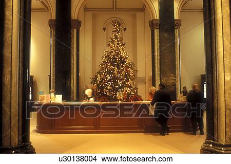 Picture -  Smithsonian Institution, Washington, DC, District of Columbia, A Christmas tree decorated for the holidays inside Smithsonian Castle of the Smithsonian Institution in Washington D. C.. Fotosearch