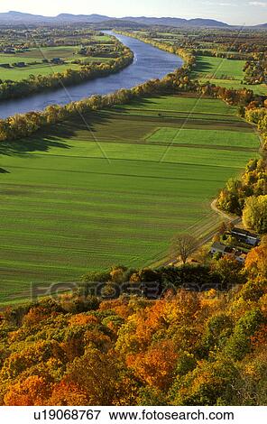 Stock Photo -  South Deerfield, MA, Massachusetts, The Connecticut River Valley, Aerial view of the scenic Pioneer Valley along the Connecticut River from Mt. Sugarloaf in South Deerfield in the autumn.. Fotosearch
