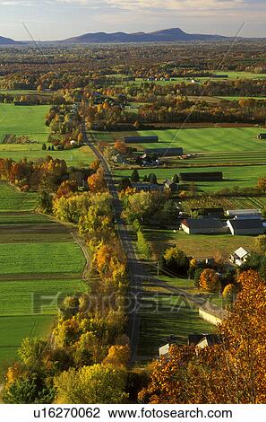 South Deerfield, MA, Pioneer Valley, Massachusetts, The Connecticut River Valley, Aerial view of the scenic Pioneer Valley from Mt. Sugarloaf in South Deerfield in the autumn. View Large Photo Image Stock Image -  South Deerfield, MA, Pioneer Valley, Massachusetts, The Connecticut River Valley, Aerial view of the scenic Pioneer Valley from Mt. Sugarloaf in South Deerfield in the autumn.. Fotosearch