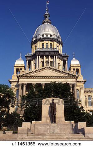 Stock Photograph -  Springfield, capitol, State Capitol, Statehouse, IL, Illinois, Abraham Lincoln statue in front of The Illinois State Capitol building in the capital city of Springfield, Illinois. . Fotosearch
