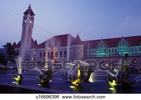 Stock Photograph -  St. Louis, MO, Missouri, View of Union Station and Milles Fountain from Aloe Plaza at night in downtown Saint Louis.. Fotosearch