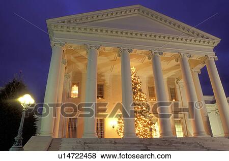 Stock Photo -  State Capitol, Richmond, State House, VA, Virginia, A large Christmas tree with white lights decorates the Virginia State Capitol at night for the holidays in the capital city of Richmond.. Fotosearch