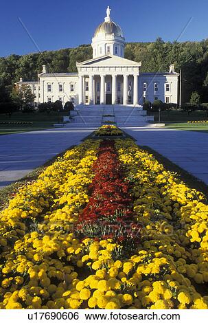 Stock Photograph -  State House, Montpelier, State Capitol, Vermont, VT, Red and yellow flowers decorate the grounds of the State House in Montpelier.. Fotosearch