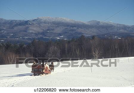 Stowe, sleigh ride, Vermont, VT, A open sleigh ride at Trapp Family Lodge in Stowe offers a beautiful scenic view of the mountains. View Large Photo Image Stock Image - Stowe, sleigh ride, Vermont, VT, A open sleigh ride at Trapp Family Lodge in Stowe offers a beautiful scenic view of the mountains.. Fotosearch