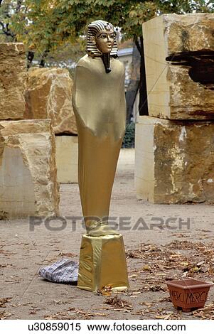 street artist, Paris, France, Europe, Street artist posing as a gold sphinx along the Avenue des Champs Elysees. View Large Photo Image Stock Photography - street artist, Paris, France, Europe, Street artist posing as a gold sphinx along the Avenue des Champs Elysees.. Fotosearch