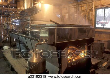 Stock Photo -  sugarhouse, interior, maple syrup, winter, East Montpelier, VT, Vermont, Boiling sap on Templeton Farm at sugaring time in early spring in East Montpelier. . Fotosearch