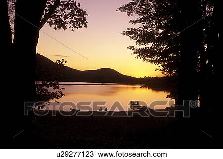 Stock Image -  sunrise, lake, Adirondacks, New York, Blue Mountain Lake, NY, Sunrise on Blue Mountain Lake in the Adirondacks.. Fotosearch