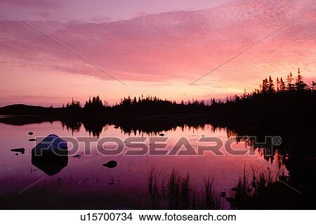 Picture -  sunrise, sunset, Newfoundland, NF, Canada, Sunset at Milan Arm in St. Anthony.. Fotosearch