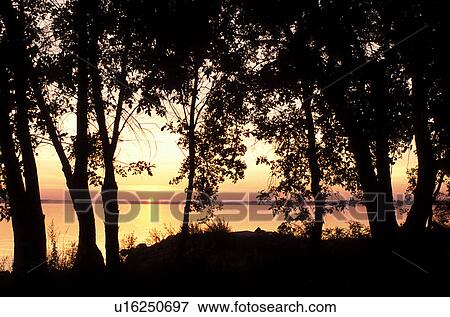 sunrise, sunset, SD, South Dakota, Watertown, Sunrise on Lake Pelican in Watertown. View Large Photo Image Stock Photo - sunrise, sunset, SD, South Dakota, Watertown, Sunrise on Lake Pelican in Watertown.. Fotosearch
