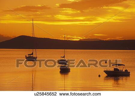 sunrise, sunset, Vermont, VT, Sunrise on Keeler Bay on Lake Champlain in South Hero. View Large Photo Image Stock Image -  sunrise, sunset, Vermont, VT, Sunrise on Keeler Bay on Lake Champlain in South Hero.. Fotosearch