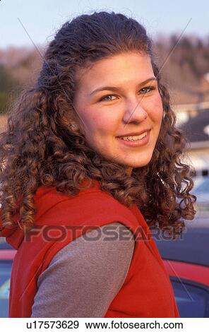 Stock Photo -  teenager, girl, face, Beautiful teenage girl poses for a picture in Montpelier Vermont, VT. Fotosearch