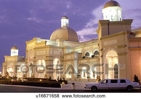 Stock Photo -  theater, Lancaster County, PA, Pennsylvania, Pennsylvania Dutch Country, Amish Country, The Sight & Sound Millennium Theatre is illuminated at night in Strasburg.. Fotosearch