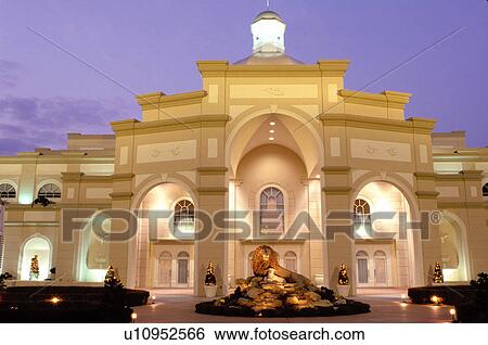 Stock Photograph -  theater, Lancaster County, Pennsylvania Dutch Country, Amish Country, PA, Pennsylvania, The Sight & Sound Millennium Theatre is illuminated at night in Strasburg.. Fotosearch