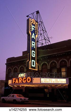 Stock Photography -  theater, neon lights, Fargo, ND, North Dakota, Fargo Theater illuminated at night with neon lights in downtown Fargo.. Fotosearch