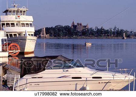 Thousand Islands, Alexandria Bay, New York, St. Lawrence River, NY, Uncle Sam Boat Tours on Alexandria Bay along the St. Lawrence River. Boldt Castle in the background. View Large Photo Image Stock Image - Thousand Islands, Alexandria Bay, New York, St. Lawrence River, NY, Uncle Sam Boat Tours on Alexandria Bay along the St. Lawrence River. Boldt Castle in the background.. Fotosearch