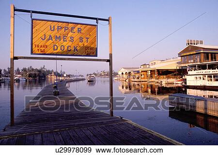 Stock Photo -  Thousand Islands, Alexandria Bay, New York, St. Lawrence River, NY, St. James Dock in Alexandria Bay along the St. Lawrence River. . Fotosearch