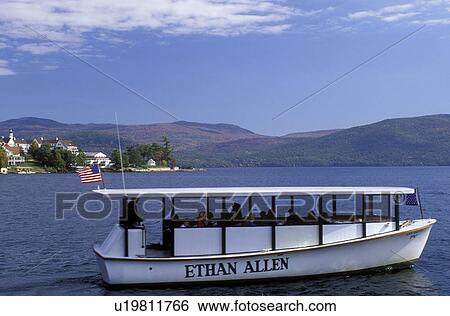 Stock Photograph -  tour boat, Adirondacks, Lake George, Bolton Landing, New York, NY, The Ethan Allen excursion boat tours Lake George in the autumn.. Fotosearch