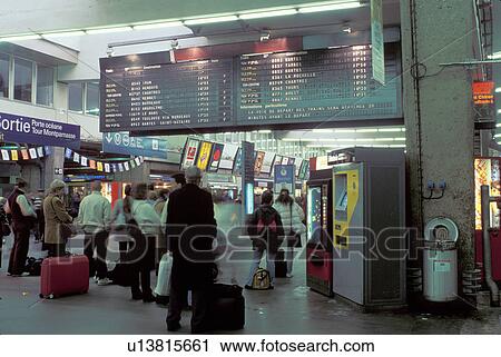 Stock Image -  train station, Paris, France, Europe, Departure and Arrival schedules at the Gare Montparnasse train station.. Fotosearch