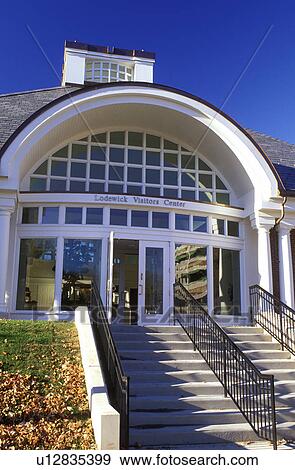 Stock Photo -  UConn, university, Storrs, Connecticut, CT, Lodewick Visitors Center on the campus of the University of Connecticut in Storrs in the autumn.. Fotosearch